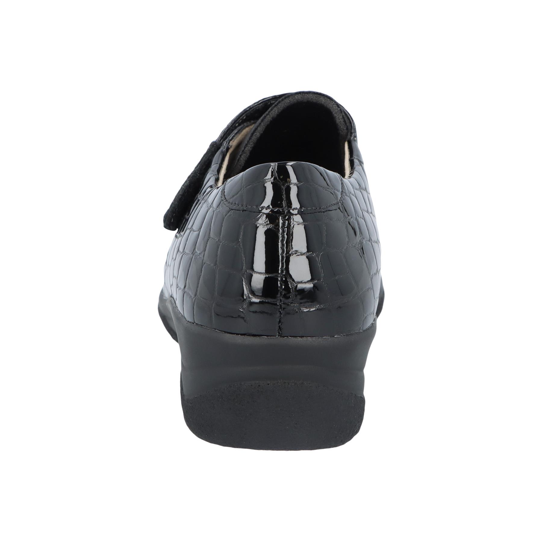 schwarze slipper hinteransicht