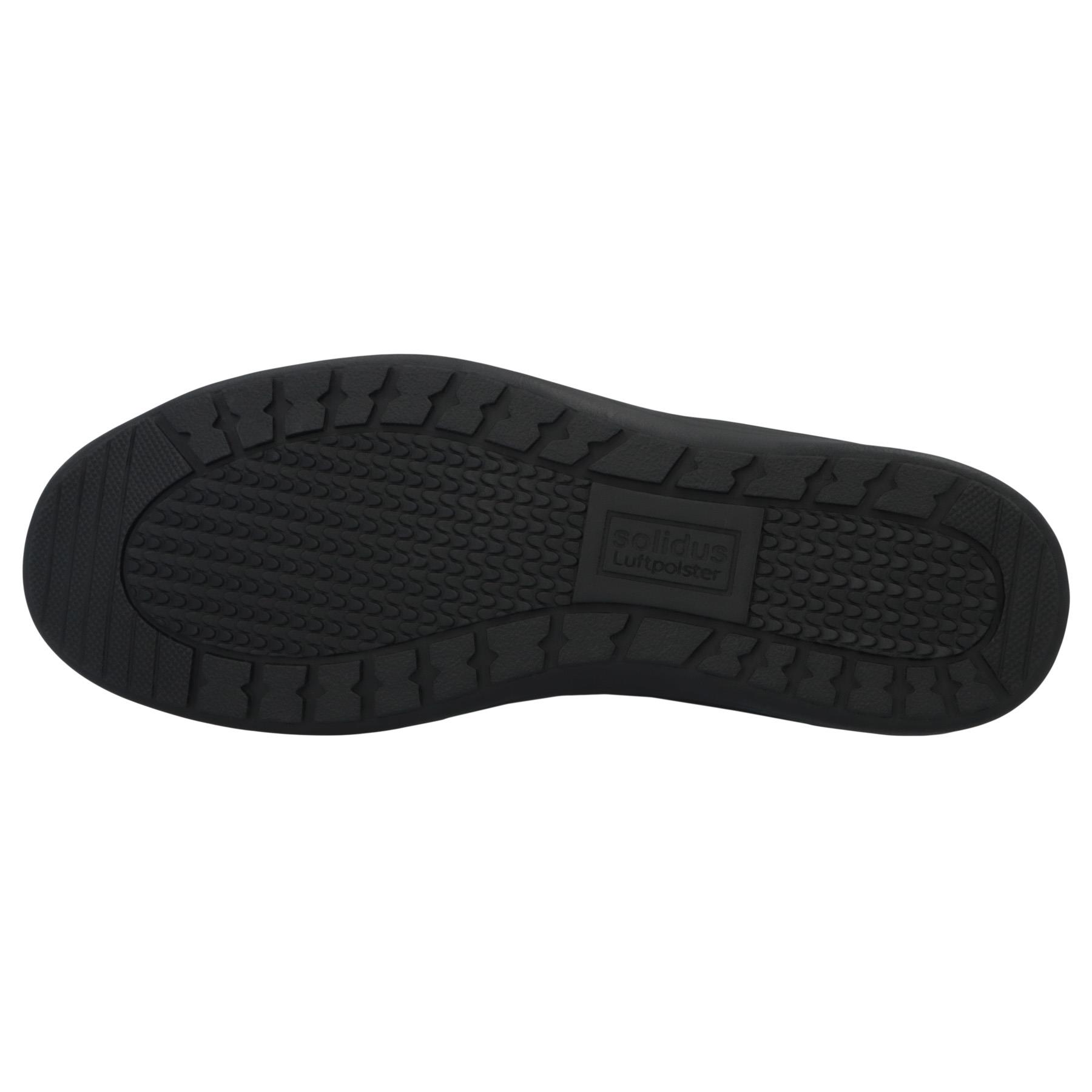 schwarze stiefel sohlenansicht
