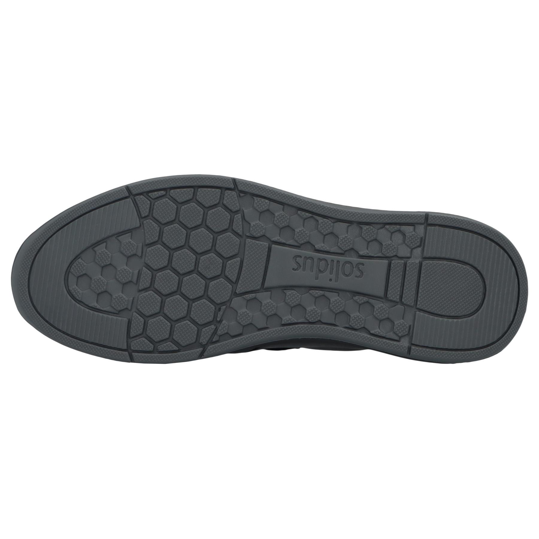 schwarze slipper sohlenansicht